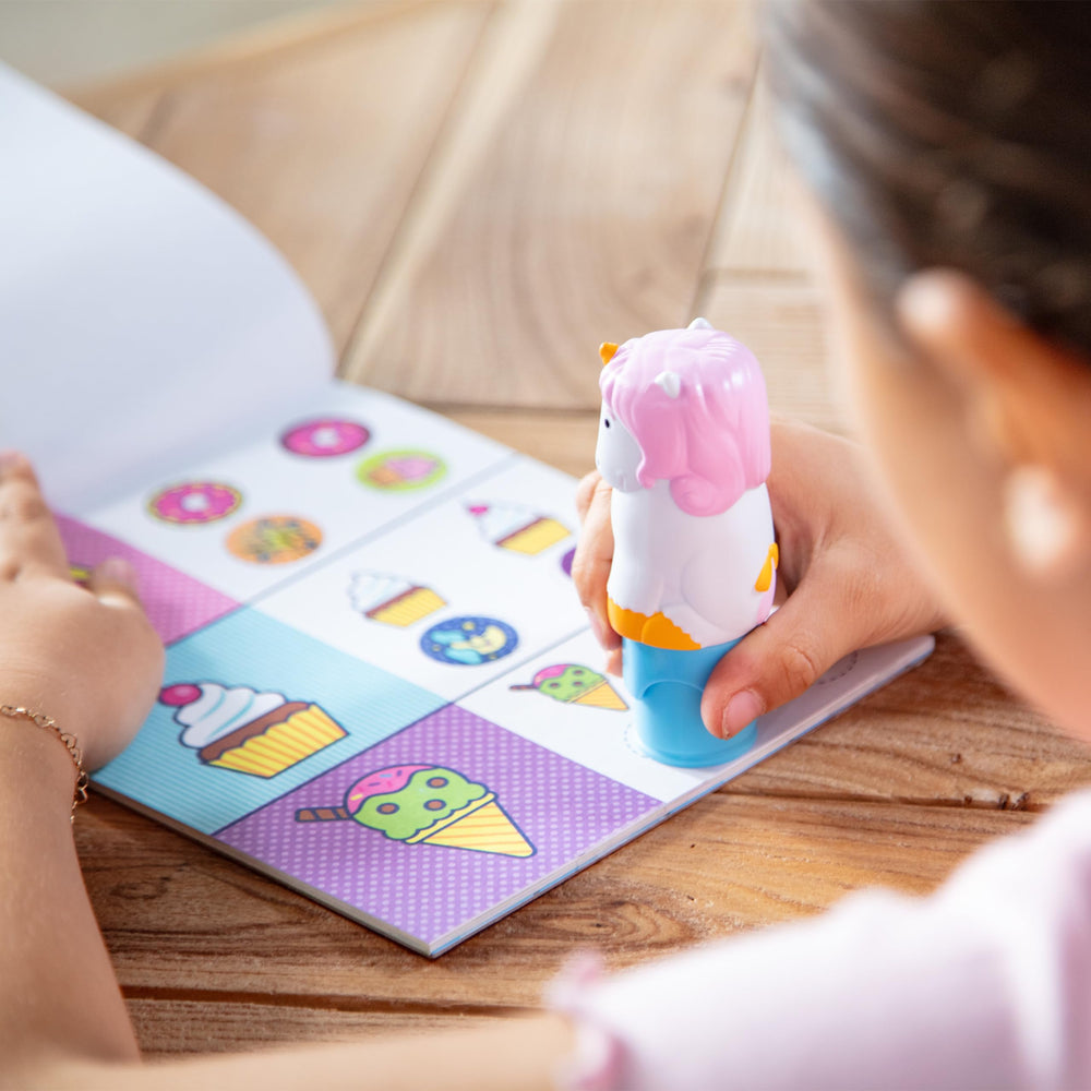 Melissa & Doug Sticker WOW built-in stamper storage keeps essentials organized.