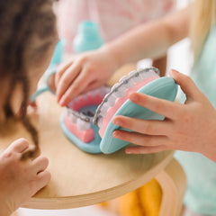 Melissa and Doug toothbrush and toothpaste set encourages brushing practice during playtime