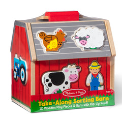 Sorting pieces from the Take-Along Barn demonstrating shape recognition