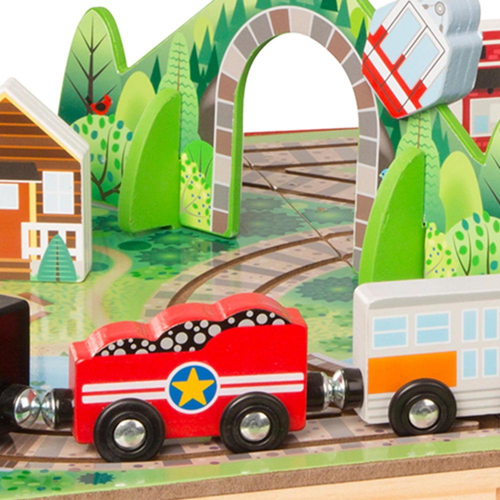 Melissa & Doug Take-Along Railroad features three colorful wooden trains for toddler exploration.
