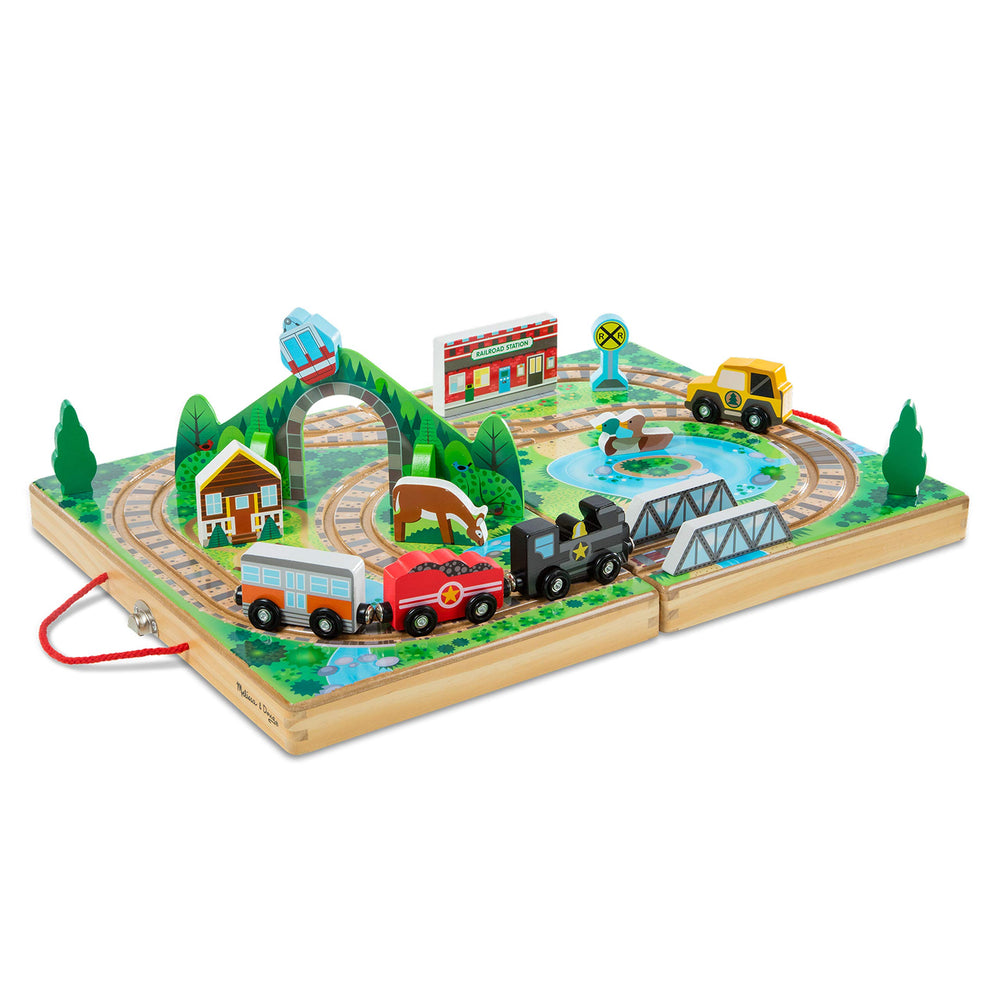 Melissa & Doug Take-Along Railroad unfolded case enables portable, screen-free play on the go.