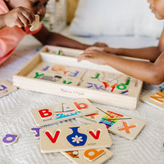 Melissa and Doug uppercase and lowercase letters on boards for letter recognition