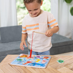 Wooden fishing board with magnets from Melissa & Doug for fine motor practice.