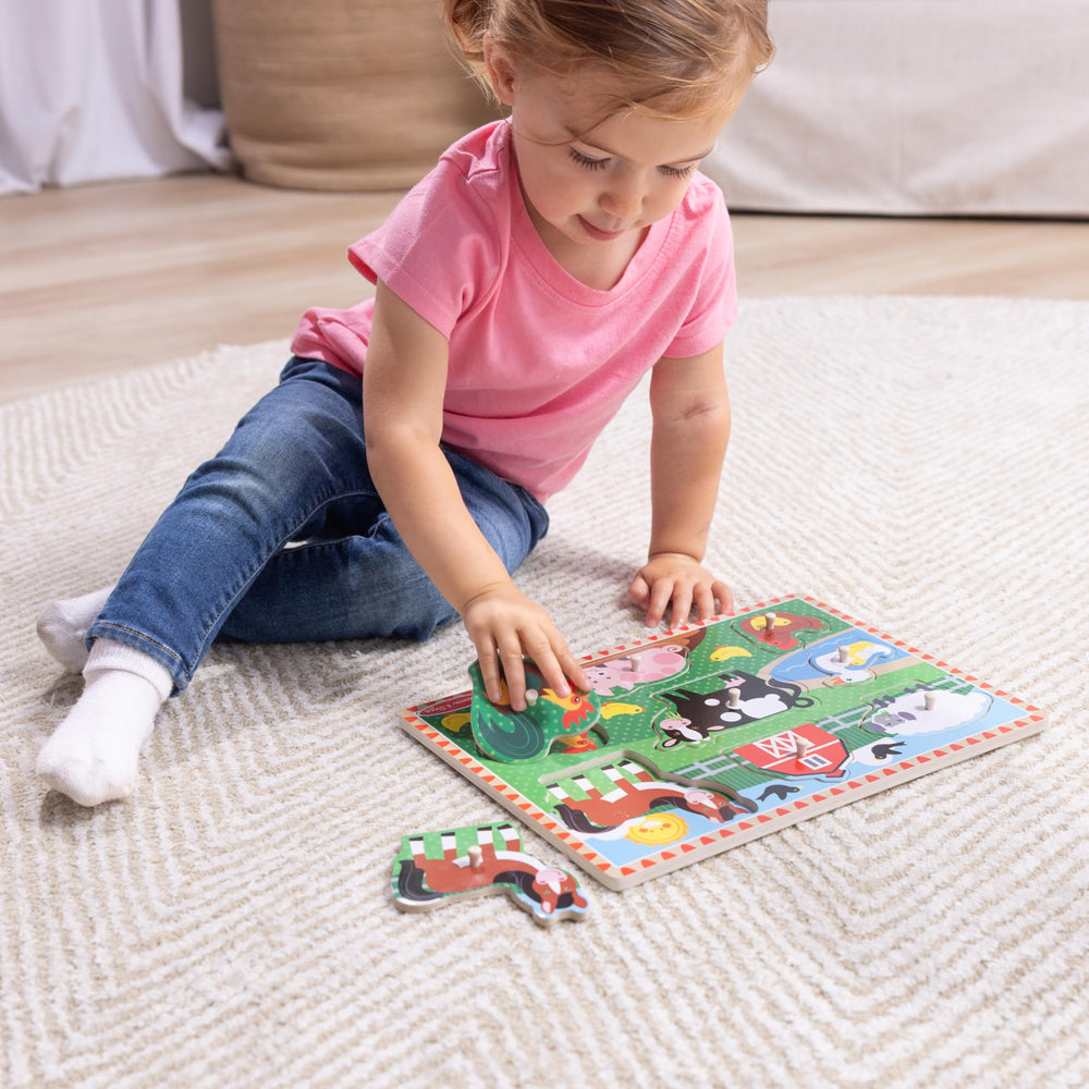 Melissa & Doug peg puzzle with pets highlights fine motor development through play