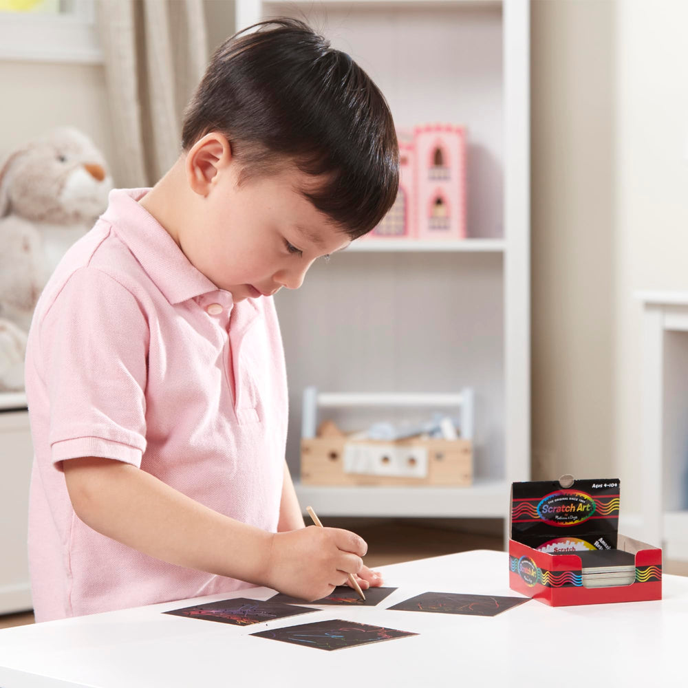 Melissa & Doug wooden stylus for scratch-art play revealing rainbow hues.