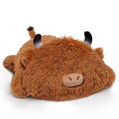 Mewaii cow plush pillow resting on sofa as cozy accent