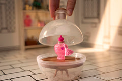 MGA's Miniverse Skele-Gro mini potion features vivid details for display.