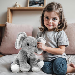 Mikee Fluffie elephant plush with long soft fur for gentle touch.