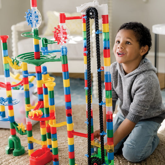 MindWare Colossal Elevator Marble Run with elevator in action boosts imaginative play.