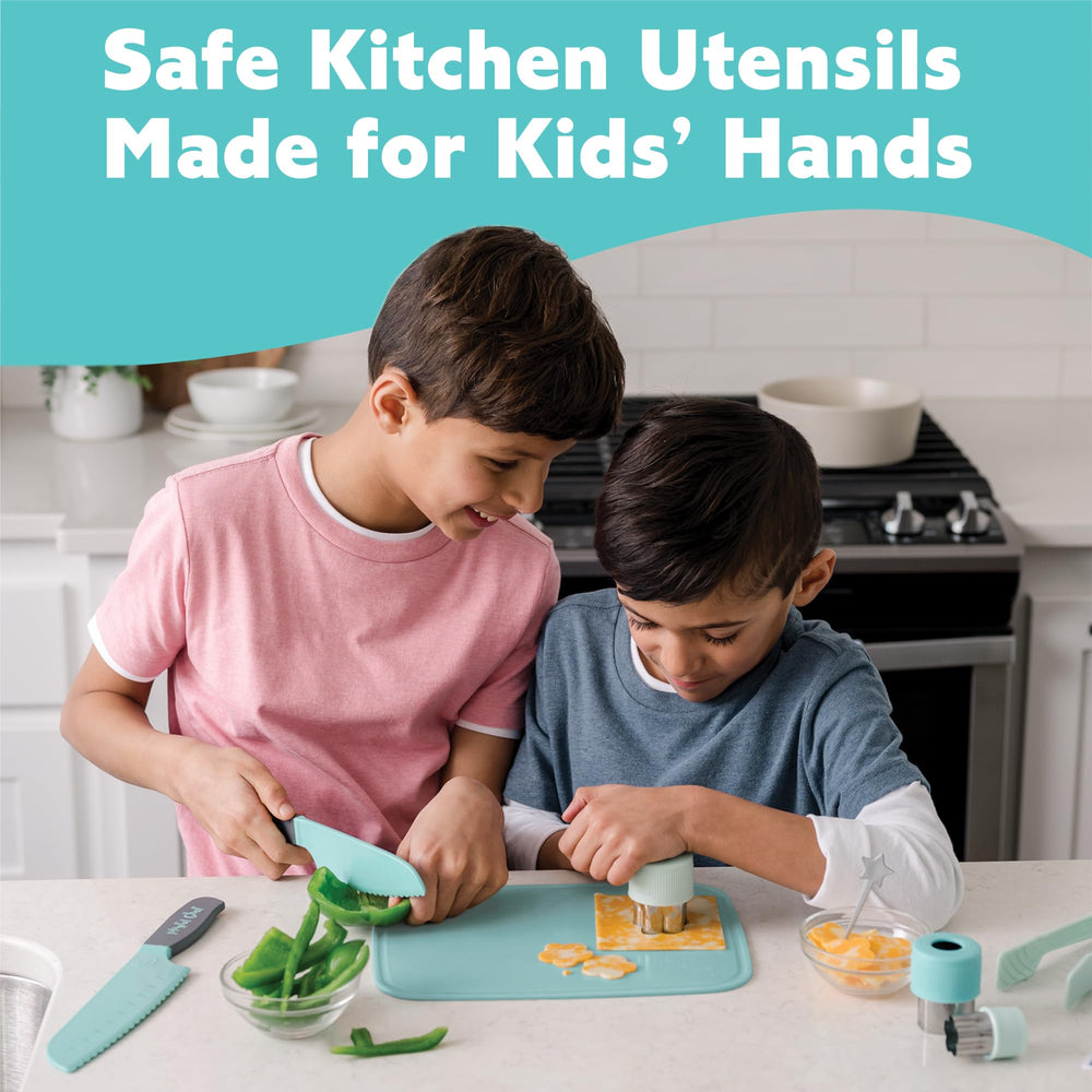 MindWare Playful Chef tongs and measuring spoons support easy, accurate prep.