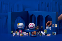 Mini Brands Mini Books Series 2 capsule—sustainable packaging, recycled plastic to support eco-conscious collecting.