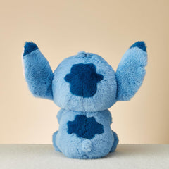 Stitch plush packaging view suggesting gift-ready presentation.