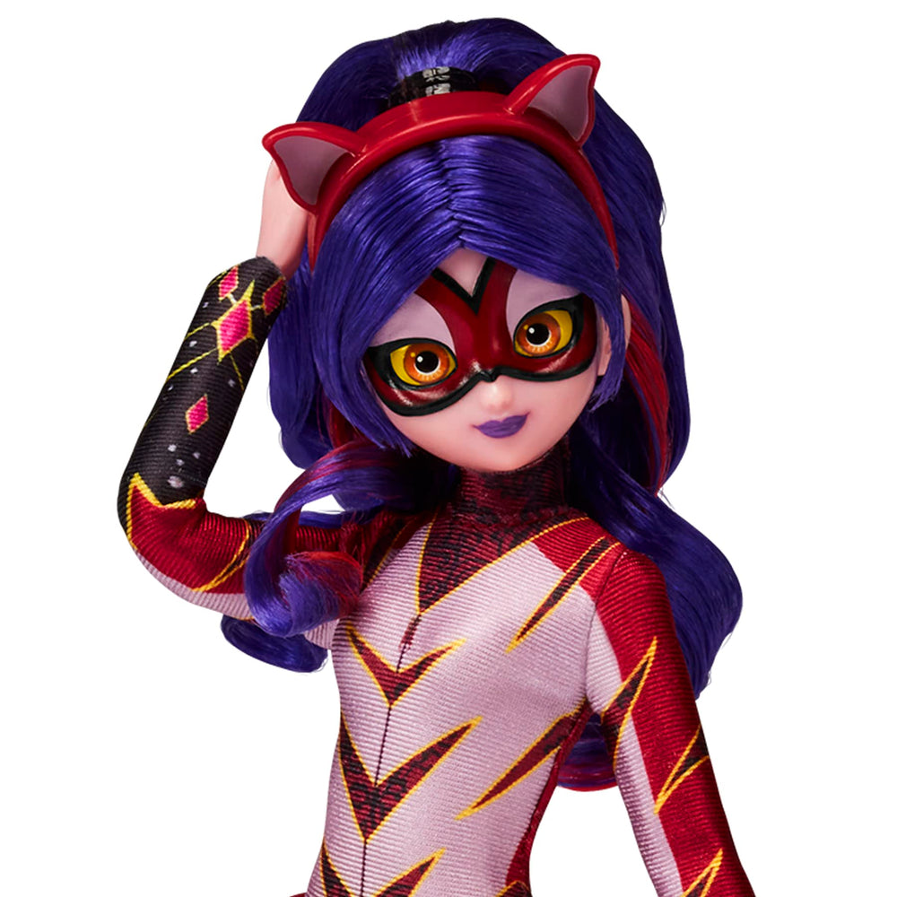 Miraculous doll includes bolas and Kwami Roaar for imaginative play.