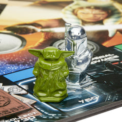 Monopoly Star Wars Mandalorian Edition Grogu token glowing with protective power
