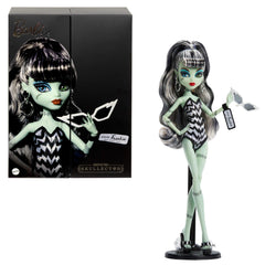 Monster High Frankie Stein doll wearing a Barbie-inspired swimsuit for beach play and display.