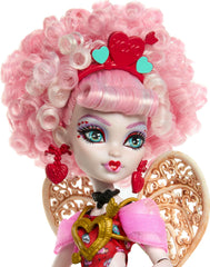 Monster High Cupid Asteria tote and eyeshadow palette enable stylish doll prep.