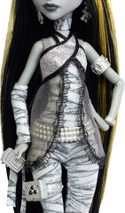 Doll-size poster with thriller-inspired artwork for display.