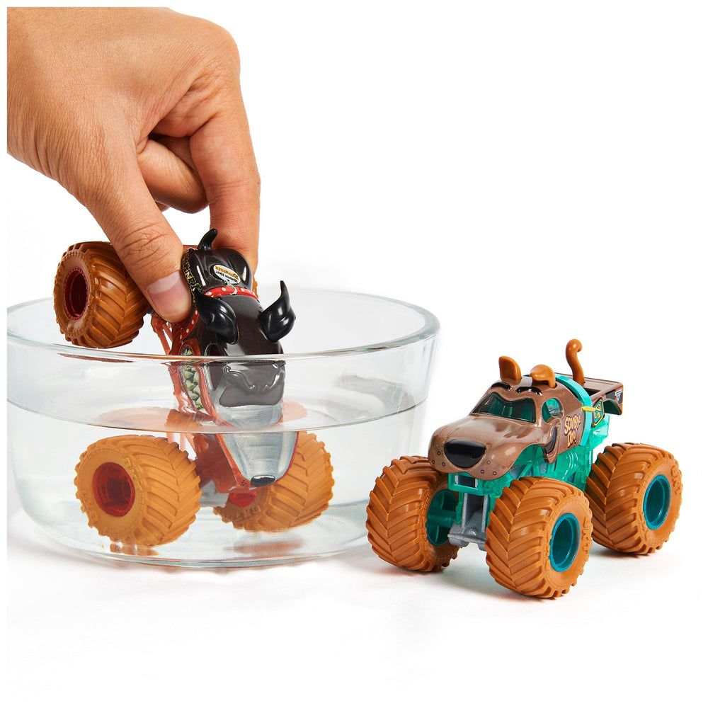 Color-change water dunk feature on Monster Jam die-cast trucks for interactive play