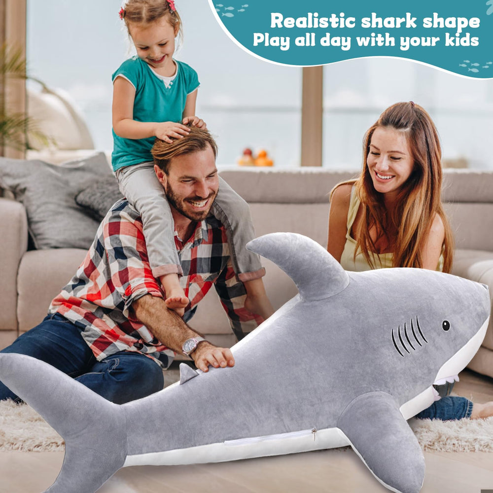 MorisMos oversized shark pillow use on bed for neck and body support.