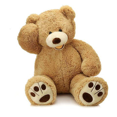 MorisMos Smiling Giant Teddy Bear stands tall in light brown plush for cozy cuddles.