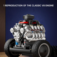 Mould King Mini V8 engine piston-motion detail highlights realistic moving parts during build.