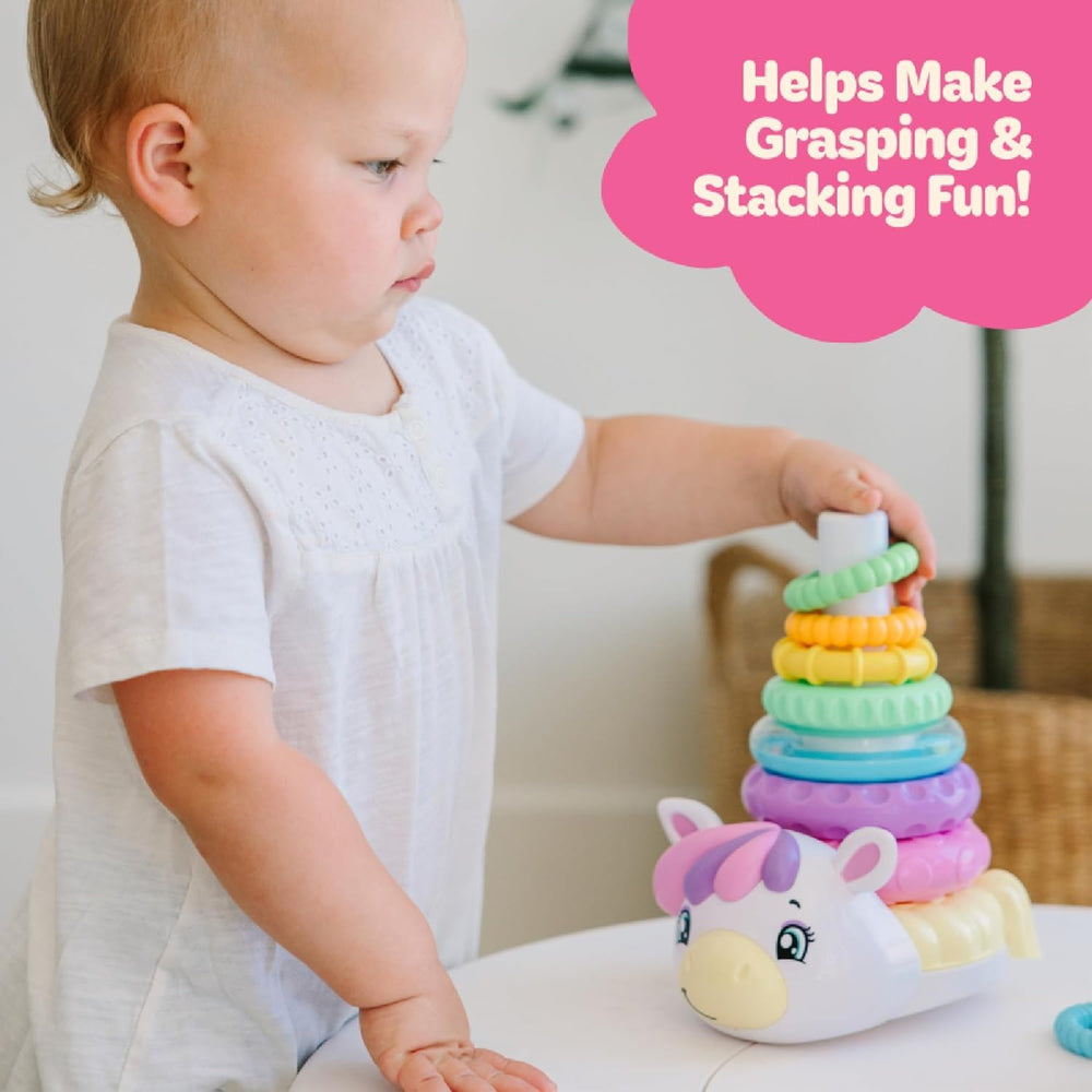 Move2Play unicorn rings rock and wobble to capture a baby's attention