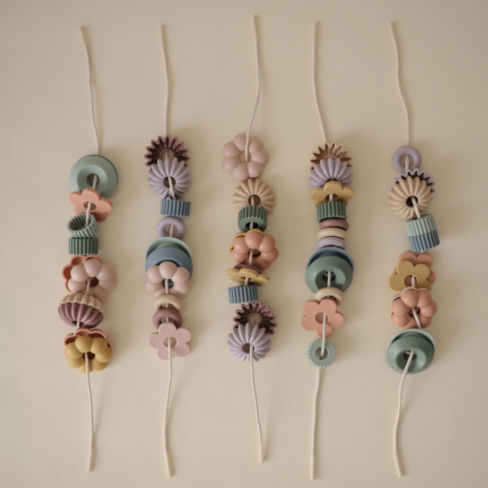 Mushie Bead Lacing Toy Set four threading strings ideal for little hands