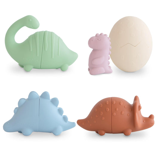 Mushie Dino Bath Toys feature three dinosaur figures for imaginative bathtime play.