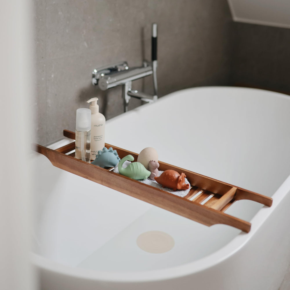 Mushie Dino Bath Toy is dishwasher safe for quick cleanup.