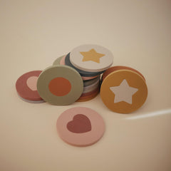 Mushie bath puzzle geometric shapes cutouts promote color and shape recognition