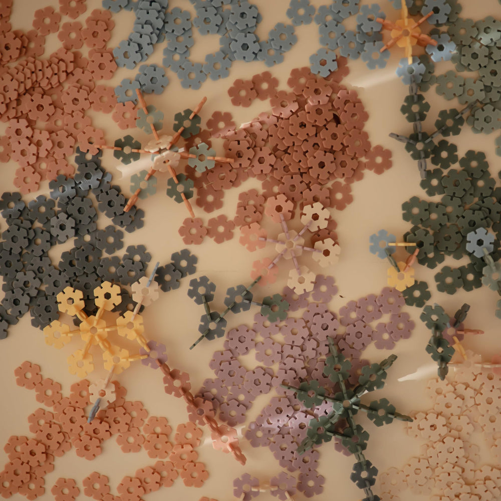 Mushie HEX Connect family play promotes shared learning and fun.