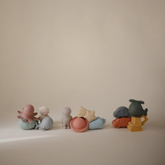 Mushie Space Bath Toy Set Packaging, tidy storage ready for tub time.