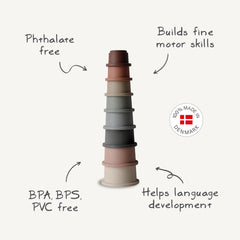 Mushie stacking cups forest tabletop play: enhances early playtime through shape and size differentiation.