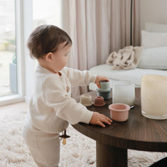 Mushie Stacking Cups Toy, designed in Denmark, supports durable play for growing toddlers.