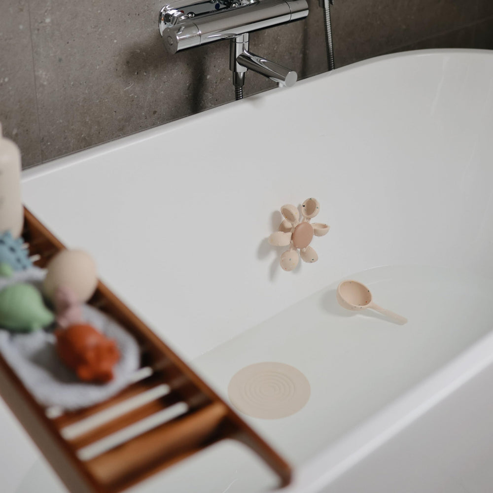 Mushie Water Wheel Bath Toy cups and water flow spark bath time imagination