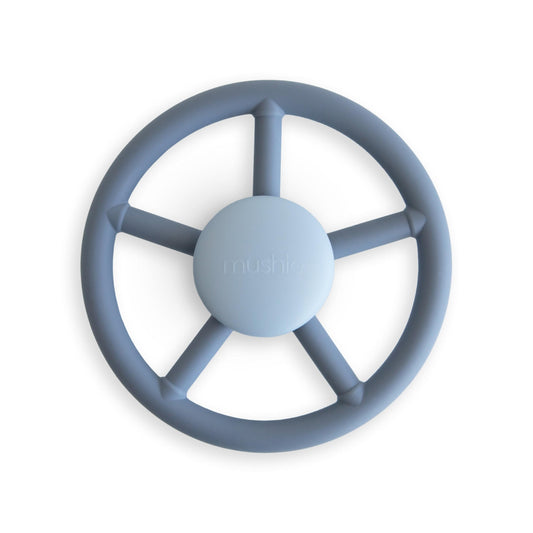 Mushie Wheel Suction Spinner Toy in bath with bright colors for bath time exploration