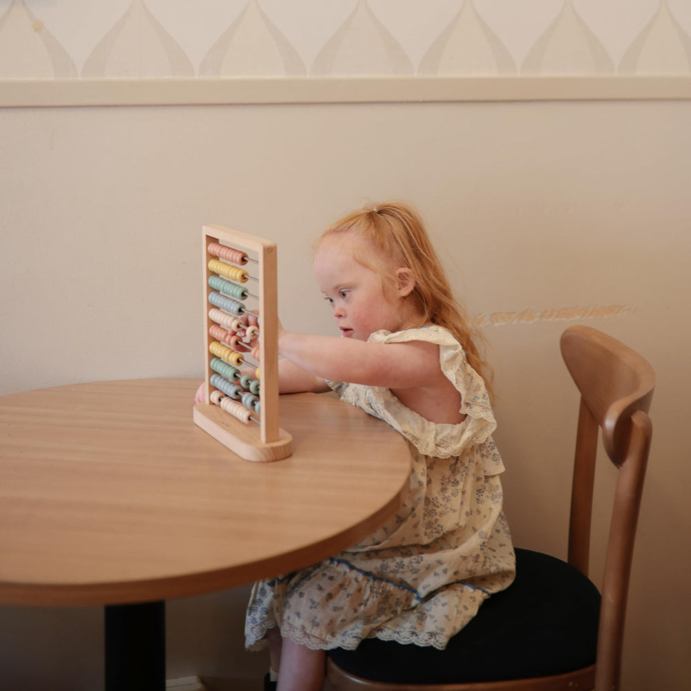 Mushie wooden abacus uses FSC-certified wood for durable, eco-friendly use.