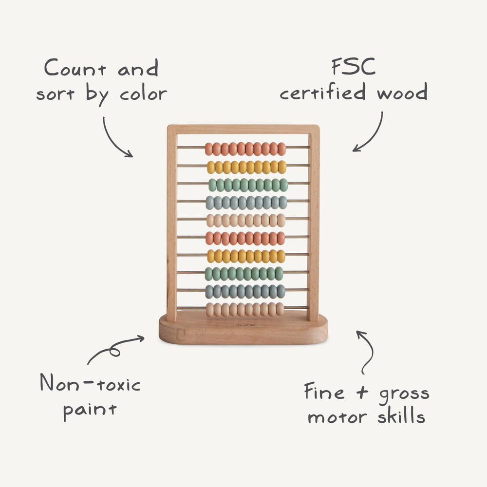 Mushie abacus wooden rails form a sturdy frame for hands-on learning.