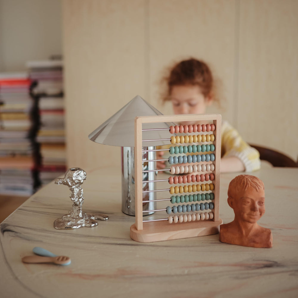 Mushie abacus is easy to wipe clean after playful activities.