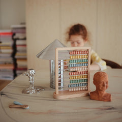 Mushie abacus is easy to wipe clean after playful activities.