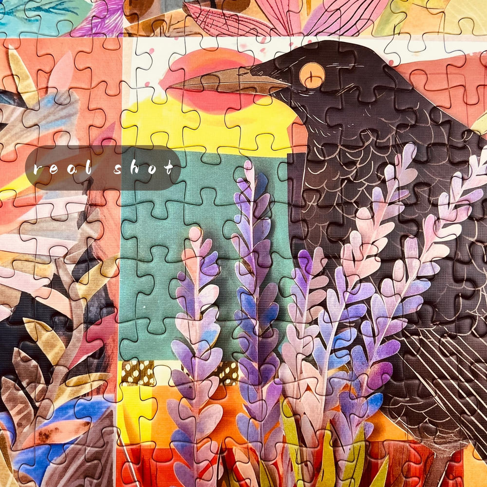 Naturelish 1000-piece jigsaw puzzle showing intricate bird artwork