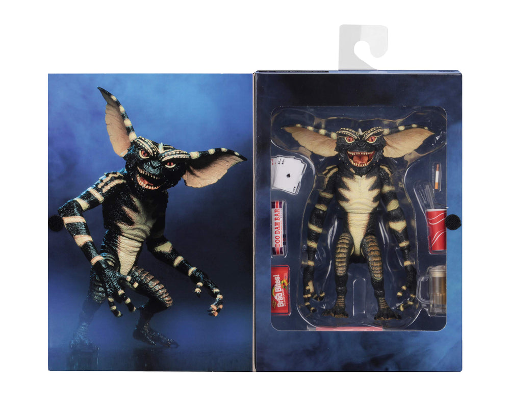 NECA Gremlins Ultimate figure with assorted candy props for nostalgic display