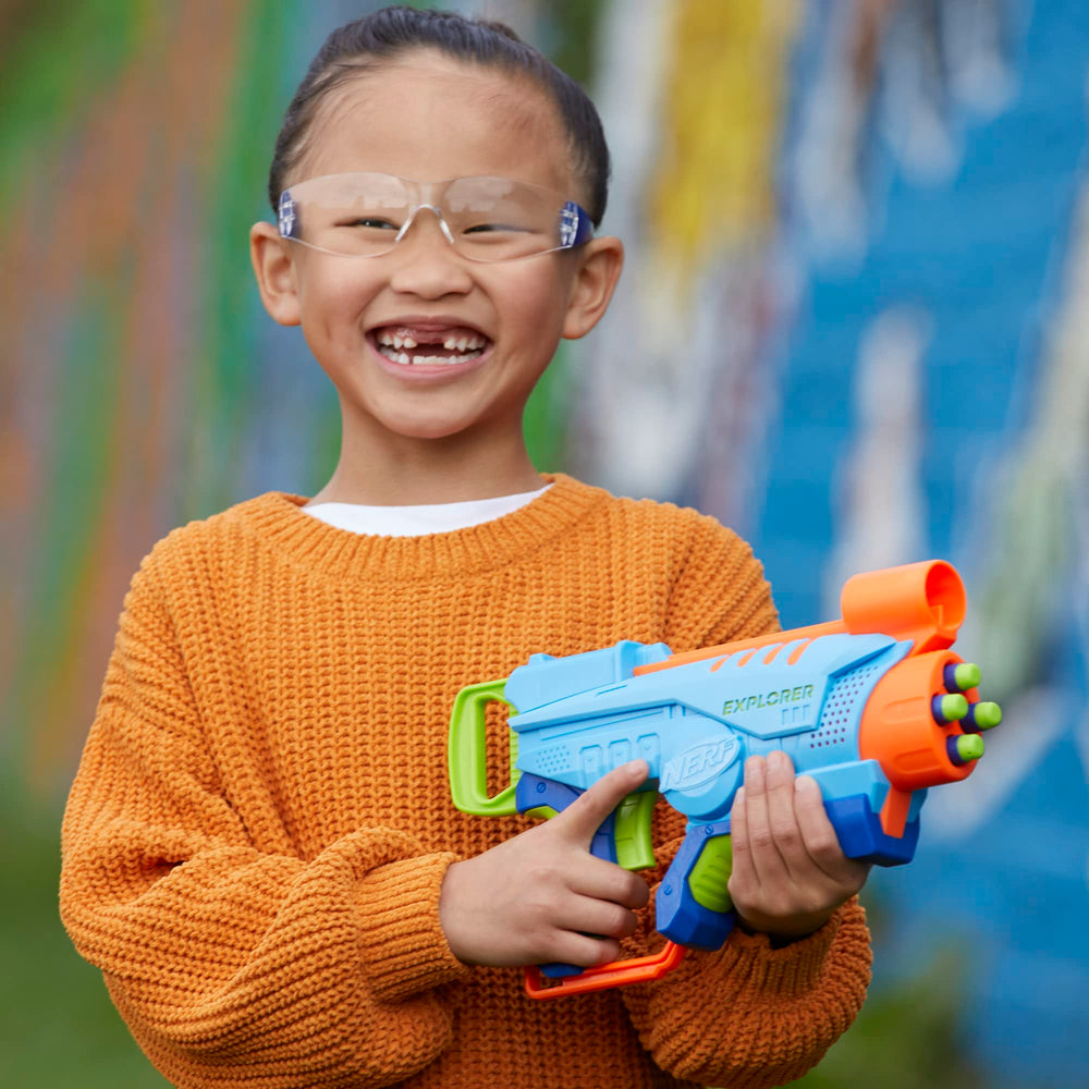NERF Elite Junior Explorer dart-dispensing action during a friendly skirmish.