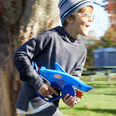 Nerf Junior Wild Sharkfire kid hand holding blaster during play.