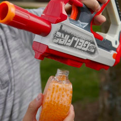 Nerf Pro Gelfire hydrated rounds in action during rapid-fire play outdoors.