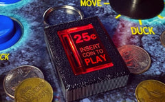 New Wave Toys 1:1 scale coin return keychain for authentic arcade feel.
