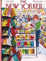 New York Puzzle Company New Yorker The Bookstore 1000-piece puzzle mid-assembly on table for family night.
