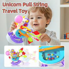 Newcrave pull-string infant toy encouraging grasping and motor practice