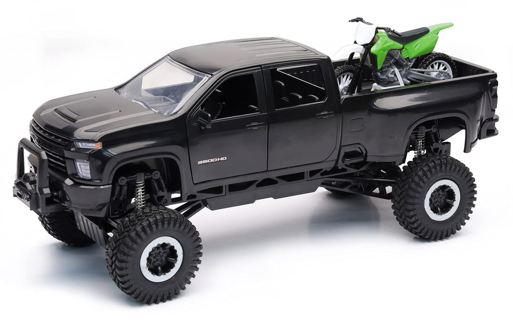 NewRay X-Treme Adventure Chevrolet 3500 HD truck with open doors for easy loading.