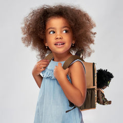 Nice2you doll playing outdoors in a durable, portable setting